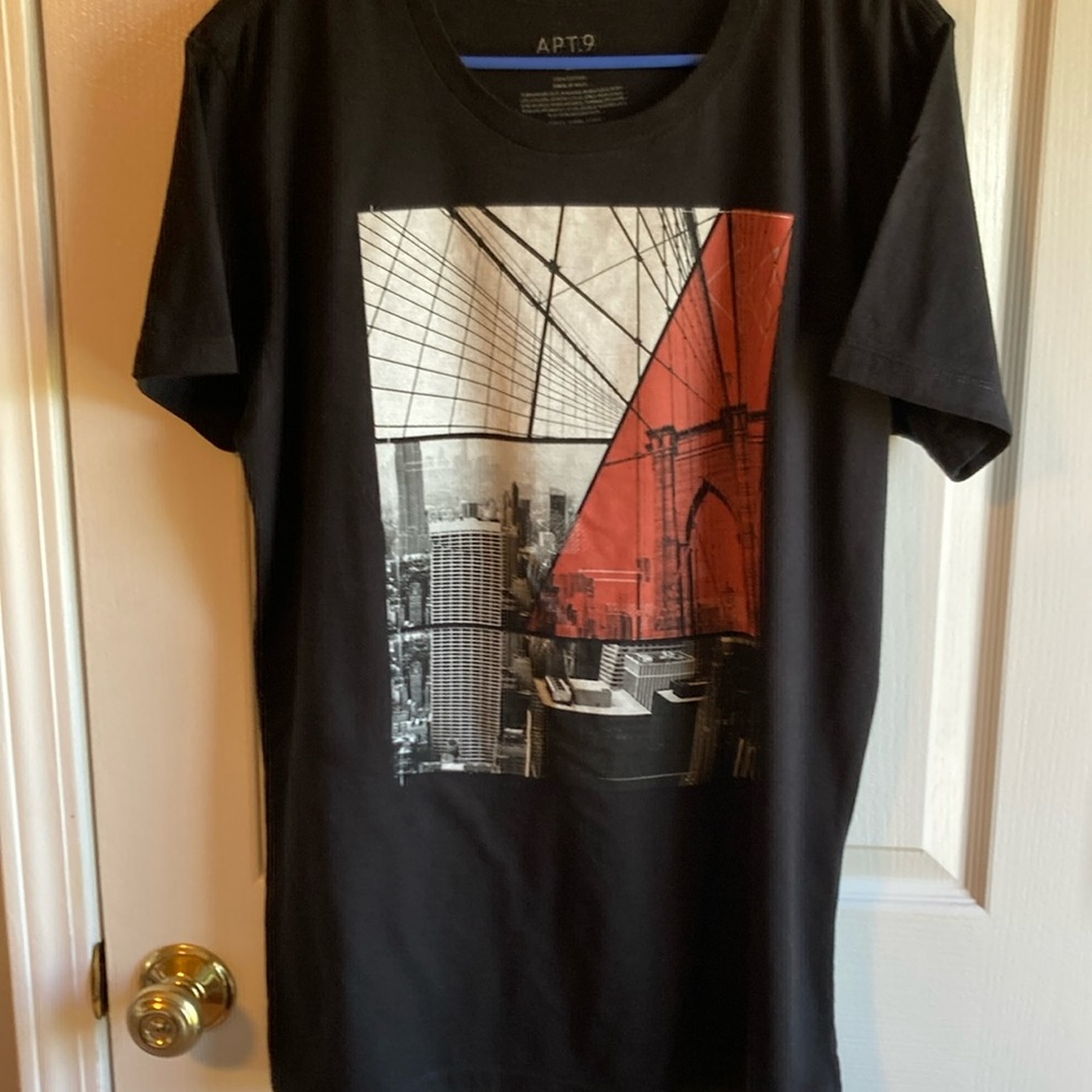 Apt.9, black unisex T-shirt, with Brooklyn bridge and city view on the front.